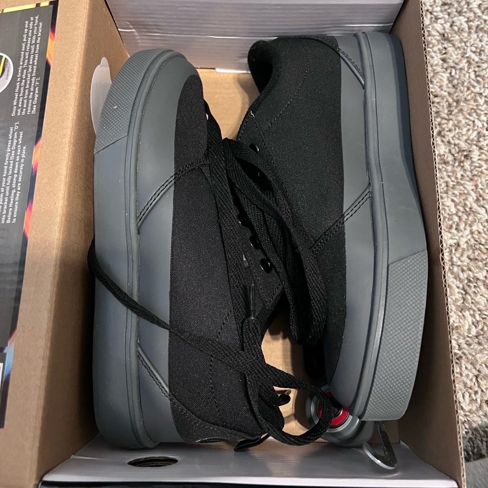 Brand new all black heelys